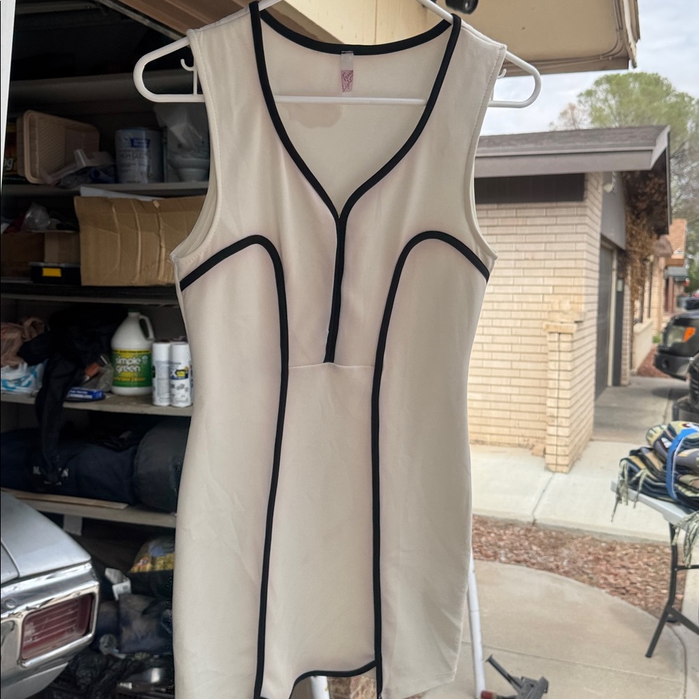 Sleeveless Cream Top with Black Trim